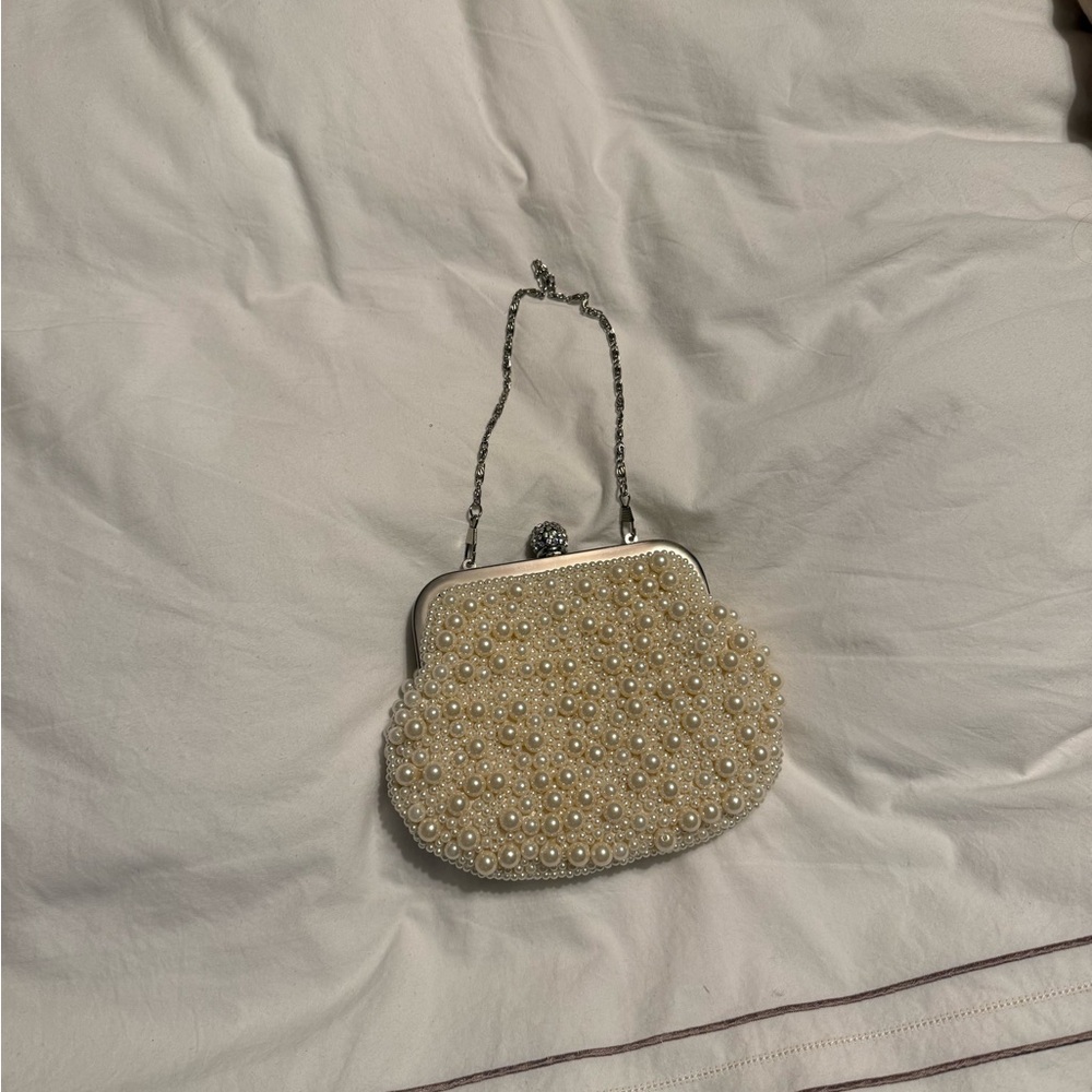 Elegant Pearl-Embellished Cream Clutch